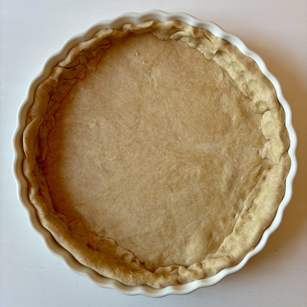Sauerteig Tarteteig in Tarteform.
